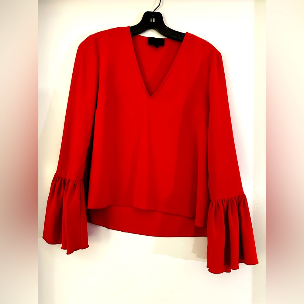 Vivid red silk top with flounce sleeves